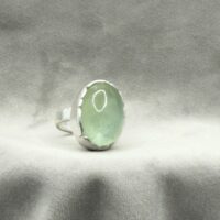 Cabochonslipad havsgrön akvamarin i powerring-format Cabochonslipad havsgrön akvamarin i powerring-format