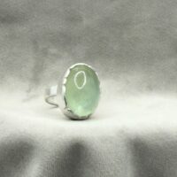 Cabochonslipad havsgrön akvamarin i powerring-format